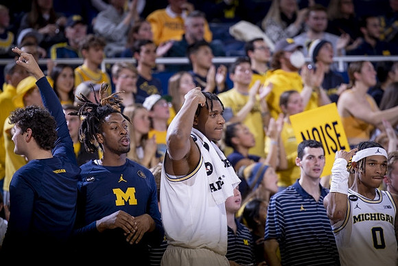 Gregg Glenn III (23), Tarris Reed Jr. (32), and Dug McDaniel (0)