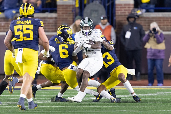 Mason Graham (55), Brandyn Hillman (6), and Wesley Walker (13)
