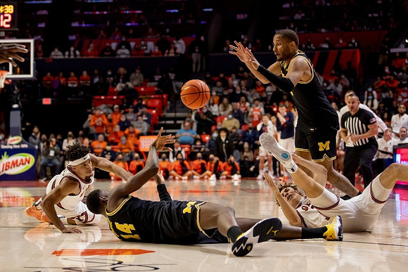 Moussa Diabate (14) and DeVante' Jones (12)