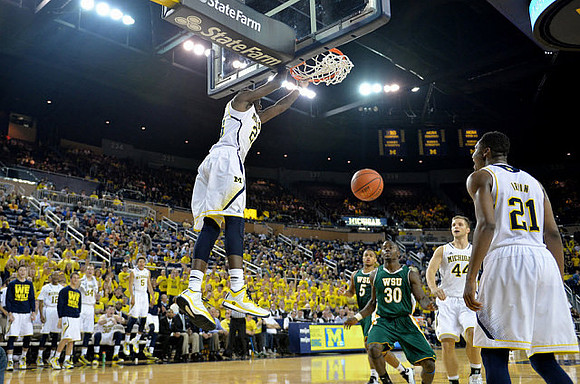 Caris LeVert (23), Max Bielfeldt (44), and Zak Irvin (21)