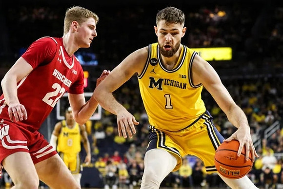 Hunter Dickinson (1) and Dug McDaniel (0)