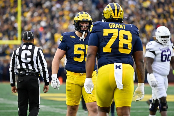 Mason Graham (55) and Kenneth Grant (78)