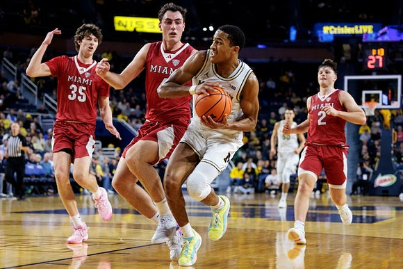 Nimari Burnett (4) and Vladislav Goldin (50)