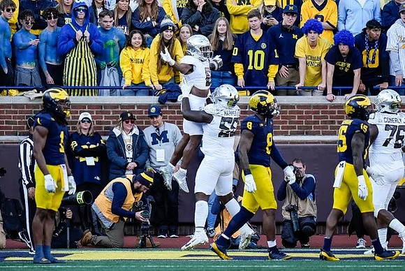 Jaishawn Barham (1), Derrick Moore (8), and Ernest Hausmann (15)