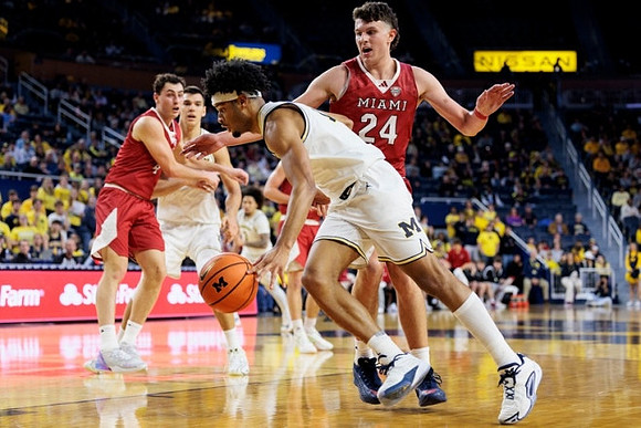 Vladislav Goldin (50) and Roddy Gayle Jr. (11)