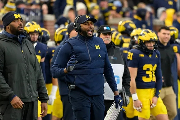 Sherrone Moore and Michigan Team