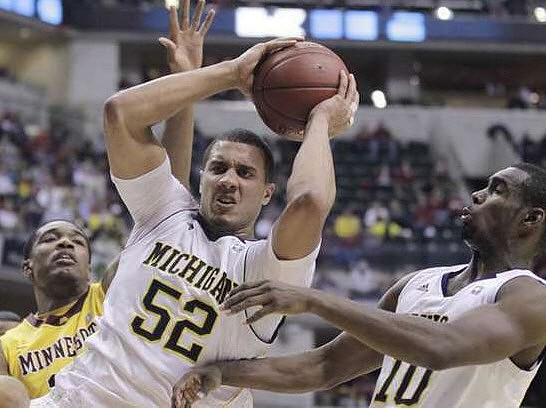 Jordan Morgan (52) and Tim Hardaway Jr. (10)