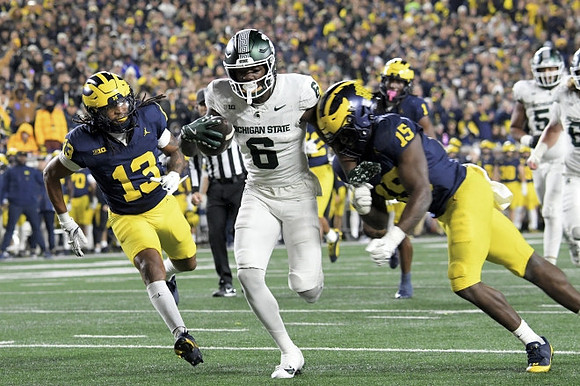 Wesley Walker (13), Ernest Hausmann (15), and Jaishawn Barham (1)