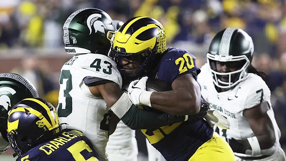 C.J. Charleston (5) and Kalel Mullings (20)