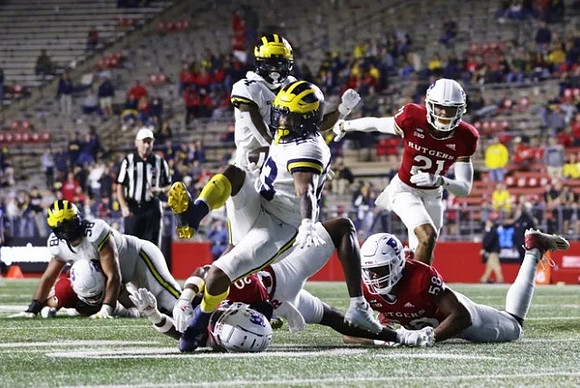 Mazi Smith (58), Michael Barrett (23), and Micah Pollard (4)