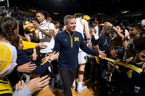 Dusty May and Michigan Team