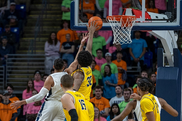 Joey Baker (15), Tarris Reed Jr. (32), and Jett Howard (13)