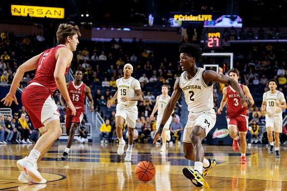 Rubin Jones (15), Danny Wolf (1), L.J. Cason (2), and Justin Pippen (10)