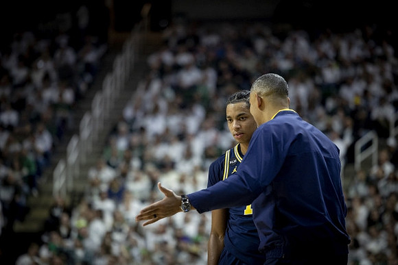 Jett Howard (13) and Juwan Howard