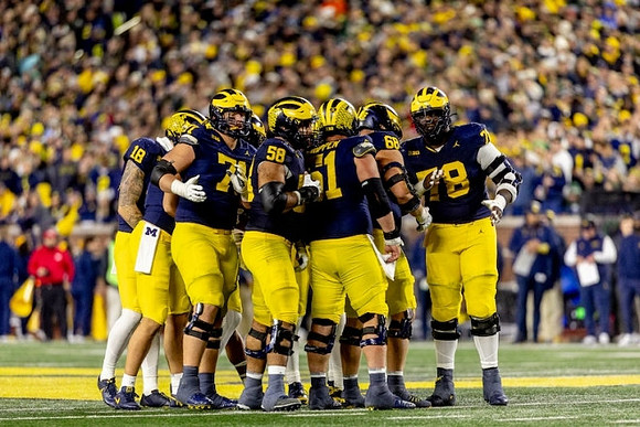 Colston Loveland (18), Evan Link (71), Giovanni El-Hadi (58), Greg Crippen (51), Josh Priebe (68), and Myles Hinton (78)