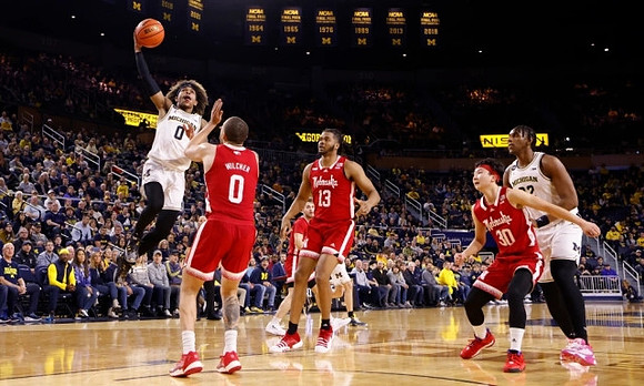 Dug McDaniel (0) and Tarris Reed Jr. (32)