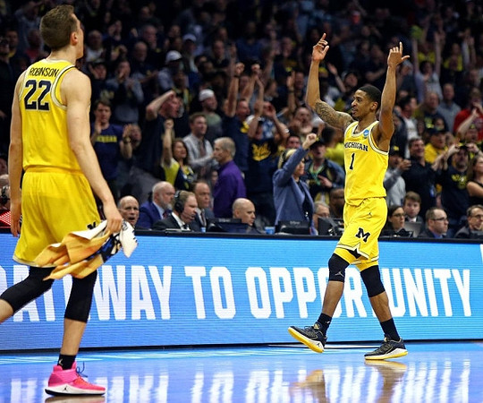 Duncan Robinson (22) and Charles Matthews (1)