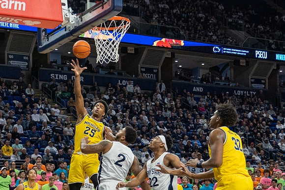 Jace Howard (25), Tarris Reed Jr. (32), and Isaiah Barnes (11)