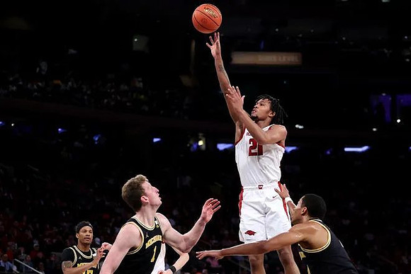 Rubin Jones (15), Danny Wolf (1), and Nimari Burnett (4)