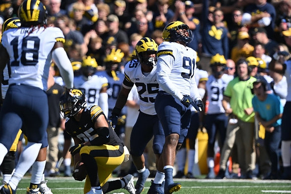 Eyabi Anoma Okie (18), Junior Colson (25), and Taylor Upshaw (91)