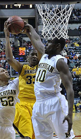 Jordan Morgan (52) and Tim Hardaway Jr. (10)