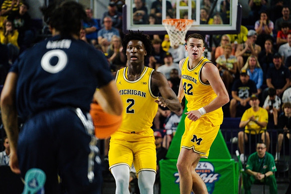 L.J. Cason (2) and Will Tschetter (42)