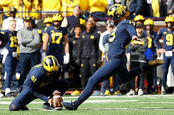 Brad Robbins (91) and Jake Moody (13)