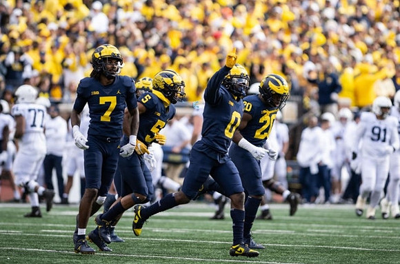 Makari Paige (7), DJ Turner (5), Mike Sainristil (0), and Kalel Mullings (20)