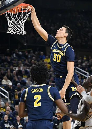 L.J. Cason (2) and Vladislav Goldin (50)
