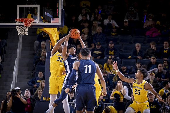 Tarris Reed Jr. (32) and Jace Howard (25)