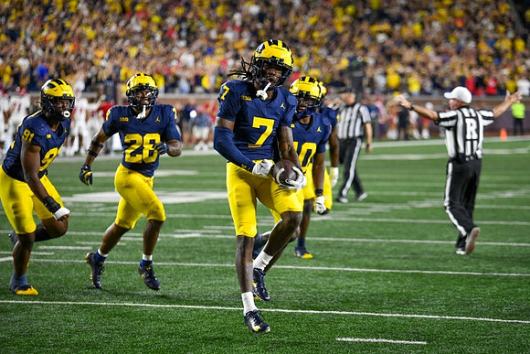 Cameron Brandt (91), Rayshaun Benny (26), Makari Paige (7), and Zeke Berry (10)