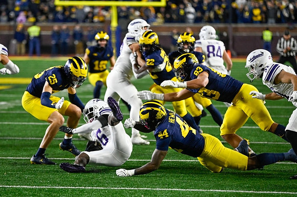 Mason Curtis (25), Jason Hewlett (44), Zack Marshall (83), and Tavierre Dunlap (22)