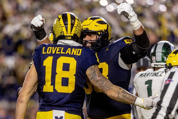 Colston Loveland (18) and Giovanni El-Hadi (58)