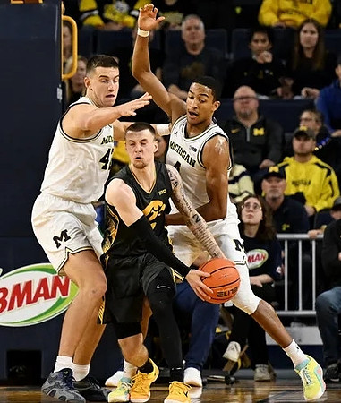 Will Tschetter (42) and Nimari Burnett (4)