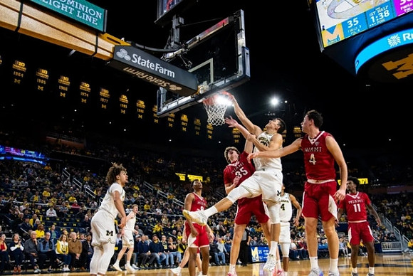 Tre Donaldson (3), Danny Wolf (1), Vladislav Goldin (50), and Nimari Burnett (4)
