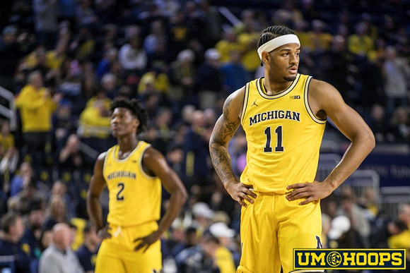 L.J. Cason (2) and Roddy Gayle Jr. (11)