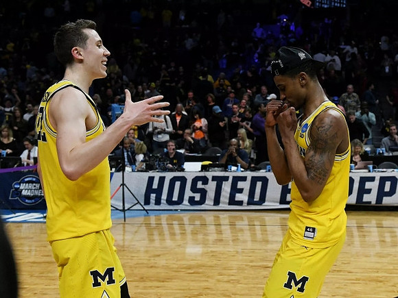 Duncan Robinson (22) and Charles Matthews (1)