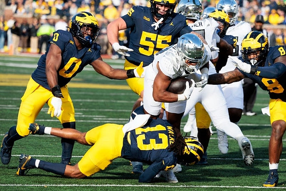 Josaiah Stewart (0), Wesley Walker (13), Mason Graham (55), and Derrick Moore (8)