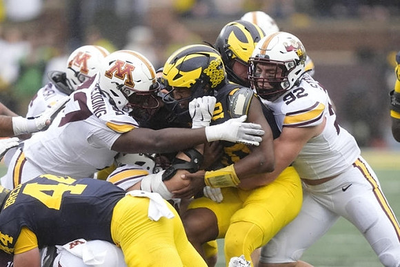 Max Bredeson (44) and Alex Orji (10)