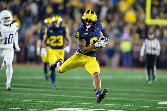 Jordan Marshall (23) and Tyler Morris (8)