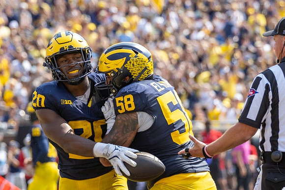 Kalel Mullings (20) and Giovanni El-Hadi (58)