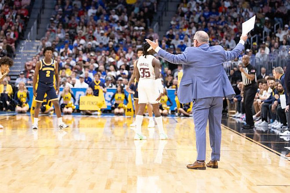 L.J. Cason (2) and Texas A&M Head Coach Buzz Williams