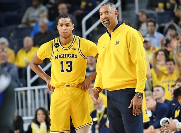Jett Howard (13) and Juwan Howard