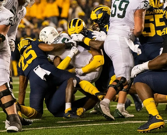 Junior Colson (25), Makari Paige (7), and Mason Graham (55)