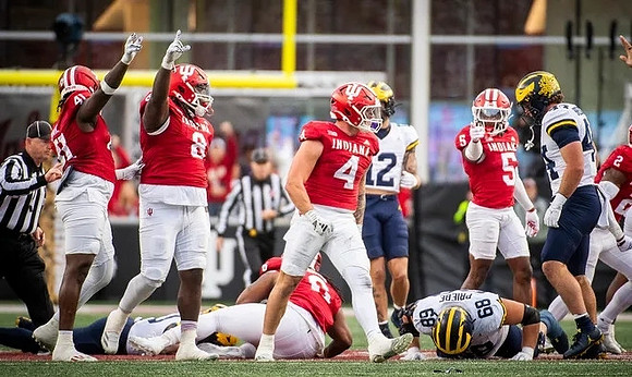 Josh Priebe (68), Kendrick Bell (12), and Max Bredeson (44)