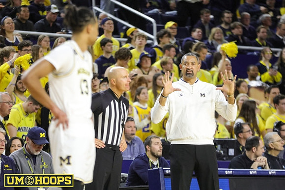 Jett Howard (13) and Juwan Howard