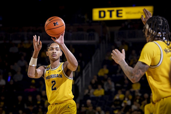 Kobe Bufkin (2) and Dug McDaniel (0)