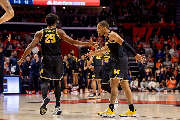 Jace Howard (25) and DeVante' Jones (12)