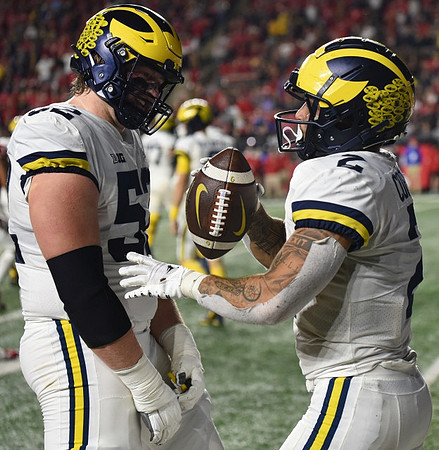 Karsen Barnhart (52) and Blake Corum (2)