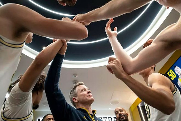 Dusty May and Michigan Team